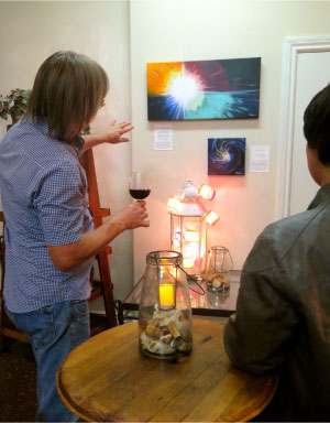 Andrew Tanis viewing Jill Tanis artwork